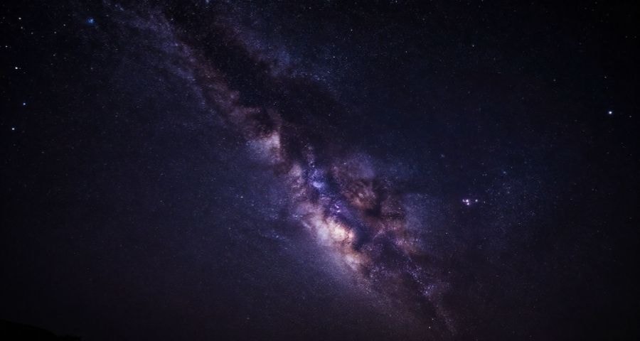 Cosmic scene blending stars and constellations with geometric shapes